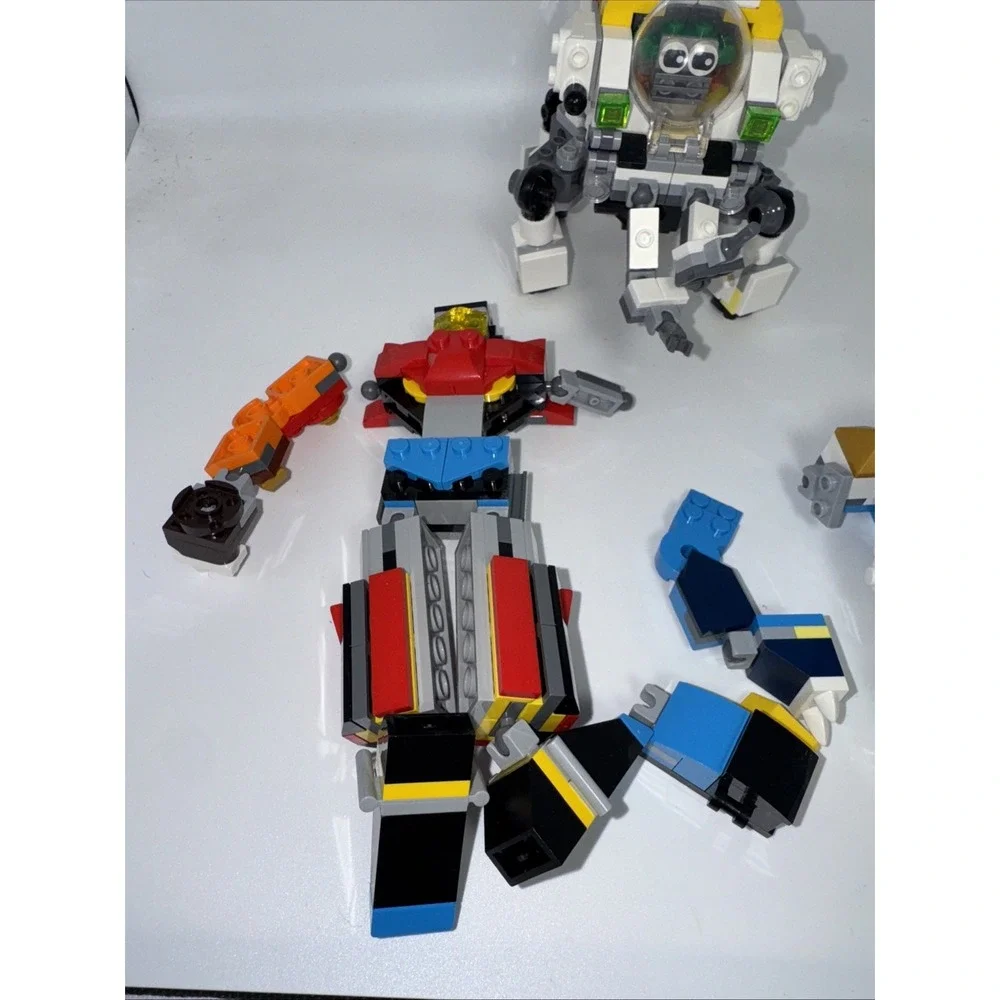 LEGO Creator and Ninjago Mechs, three sets.